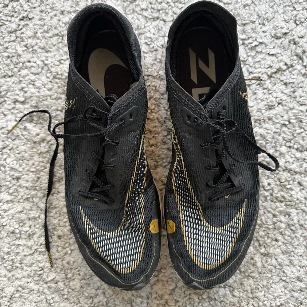 Men's Black and Gold Athletic Marathon Nike ZoomX Vaporfly size 11.5